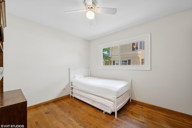 345 Catalpa Ave, Roselle, IL 60172 - bedroom featuring wood finished floors and a ceiling fan