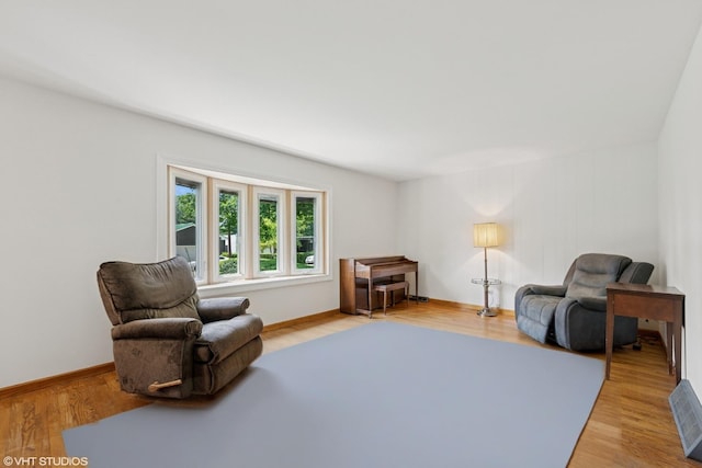 345 Catalpa Ave, Roselle, IL 60172 - living area with light wood-type flooring and baseboards