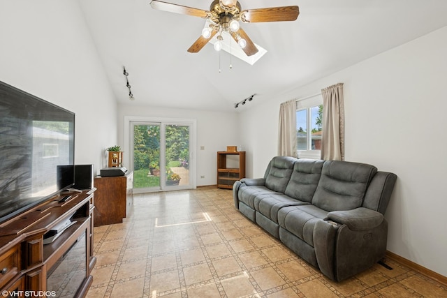 345 Catalpa Ave, Roselle, IL 60172 - living area with ceiling fan, a skylight, and high vaulted ceiling