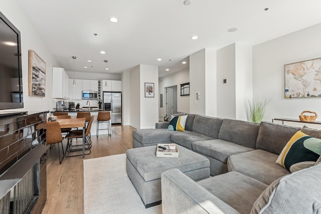 150 W Superior St Unit 1103, Chicago, IL 60654 - living room featuring recessed lighting and light wood-style flooring