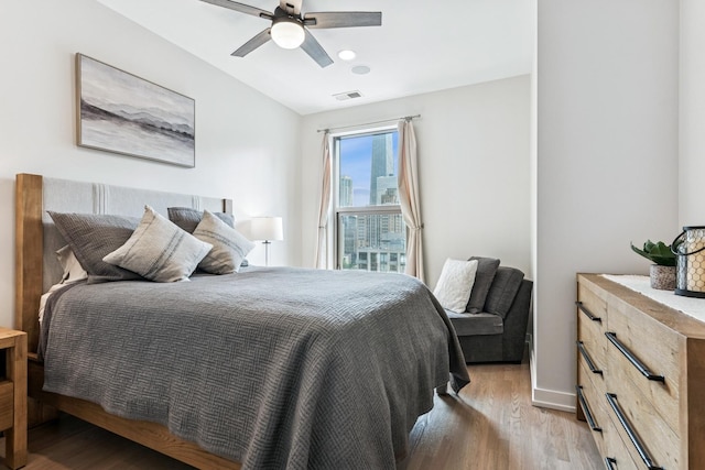 150 W Superior St Unit 1103, Chicago, IL 60654 - bedroom featuring light wood-style floors, vaulted ceiling, ceiling fan, and recessed lighting