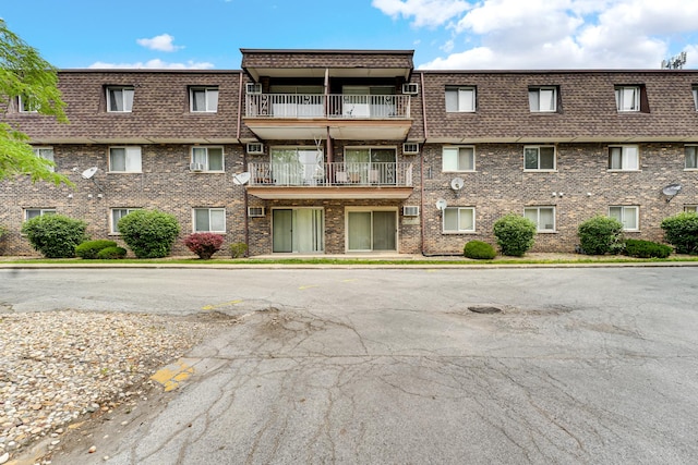 18340 Glen Oak Ave Unit 1D, Lansing, IL 60438 - view of apartment building / complex with uncovered parking