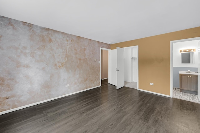 18340 Glen Oak Ave Unit 1D, Lansing, IL 60438 - unfurnished bedroom featuring dark wood finished floors, a closet, and ensuite bathroom