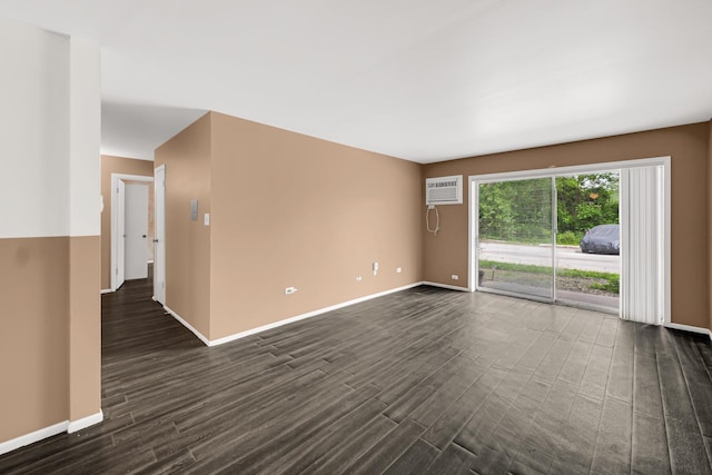 18340 Glen Oak Ave Unit 1D, Lansing, IL 60438 - spare room with a wall mounted AC and dark wood finished floors