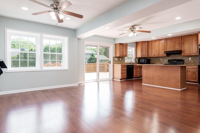 5087 Wilderness Trl, Rockford, IL 61114 - kitchen with dishwasher, a ceiling fan, under cabinet range hood, tasteful backsplash, and recessed lighting