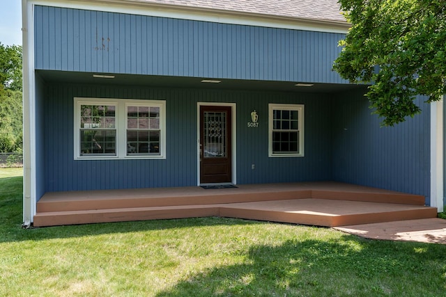5087 Wilderness Trl, Rockford, IL 61114 - doorway to property with a porch and a lawn