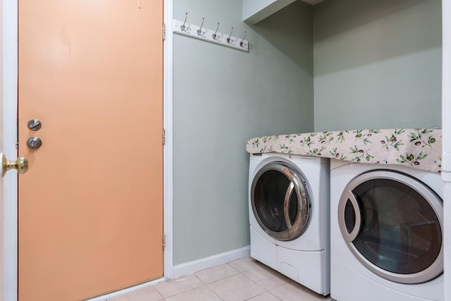 5087 Wilderness Trl, Rockford, IL 61114 - washroom with separate washer and dryer and light tile patterned floors