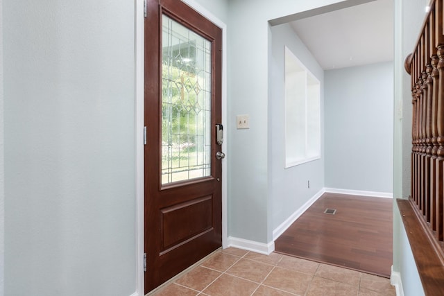 5087 Wilderness Trl, Rockford, IL 61114 - entryway with light tile patterned flooring and baseboards