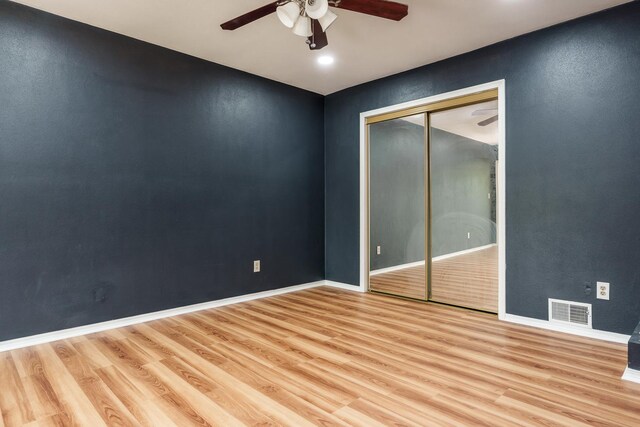 5087 Wilderness Trl, Rockford, IL 61114 - unfurnished room featuring ceiling fan, wood finished floors, and a textured wall