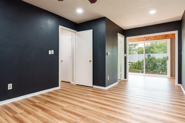 5087 Wilderness Trl, Rockford, IL 61114 - spare room featuring light wood-style floors, ceiling fan, and recessed lighting