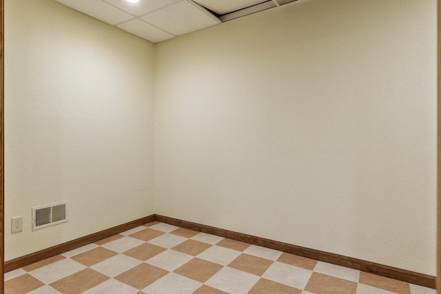 5087 Wilderness Trl, Rockford, IL 61114 - unfurnished room with a paneled ceiling and baseboards