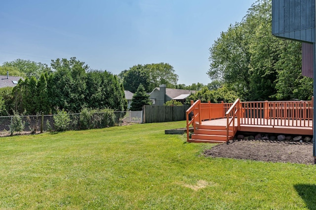 5087 Wilderness Trl, Rockford, IL 61114 - fenced backyard featuring a wooden deck