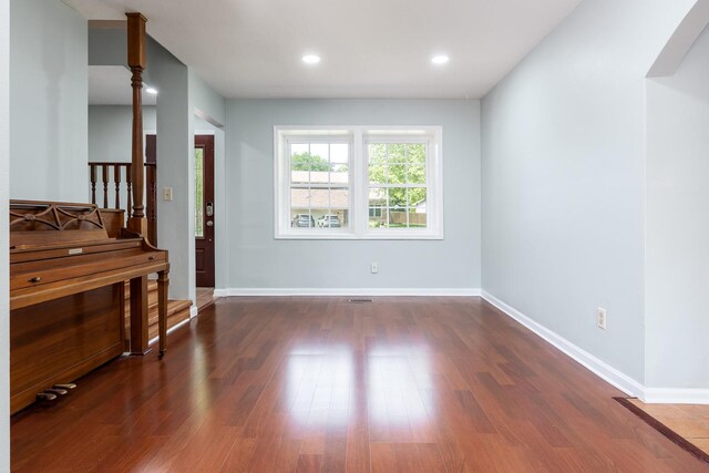 5087 Wilderness Trl, Rockford, IL 61114 - unfurnished living room featuring wood finished floors and recessed lighting