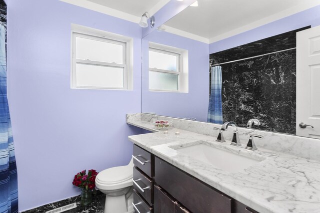 4567 N Merrimac Ave, Chicago, IL 60630 - full bath with vanity, a shower with curtain, and marble finish floors