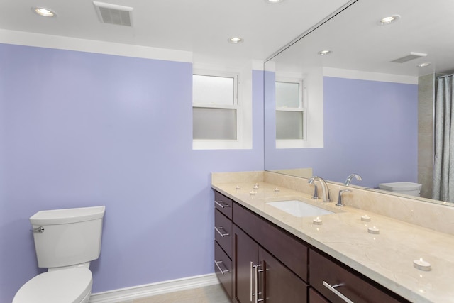 4567 N Merrimac Ave, Chicago, IL 60630 - full bath with vanity, recessed lighting, and a shower with curtain