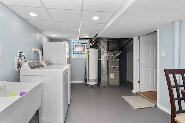 4567 N Merrimac Ave, Chicago, IL 60630 - laundry room featuring gas water heater, independent washer and dryer, heating unit, and recessed lighting