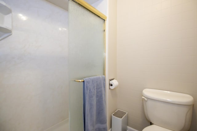 107 65th Lake Dr Unit 202, Westmont, IL 60559 - full bathroom featuring a stall shower and toilet