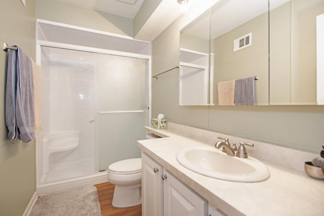 107 65th Lake Dr Unit 202, Westmont, IL 60559 - bathroom with a shower stall, vanity, and wood finished floors