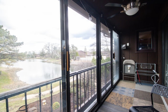 107 65th Lake Dr Unit 202, Westmont, IL 60559 - sunroom / solarium with ceiling fan, a water view, and plenty of natural light