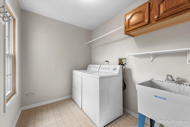 6 Ennis Ct, Cary, IL 60013 - laundry area with cabinet space and washer and clothes dryer