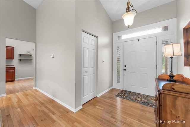 6 Ennis Ct, Cary, IL 60013 - entryway featuring light wood-style floors and high vaulted ceiling