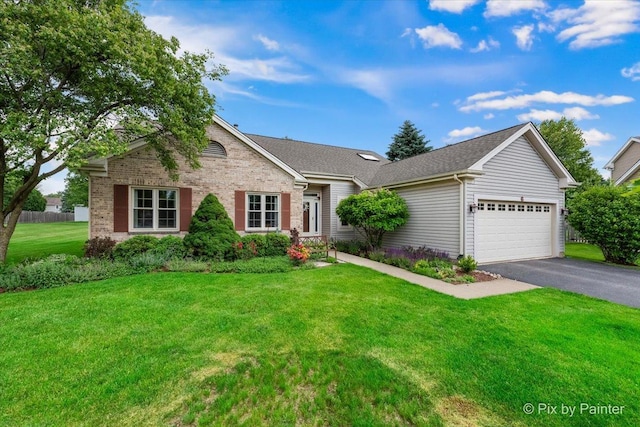 6 Ennis Ct, Cary, IL 60013 - ranch-style house featuring driveway, a garage, a front yard, brick siding, and roof with shingles