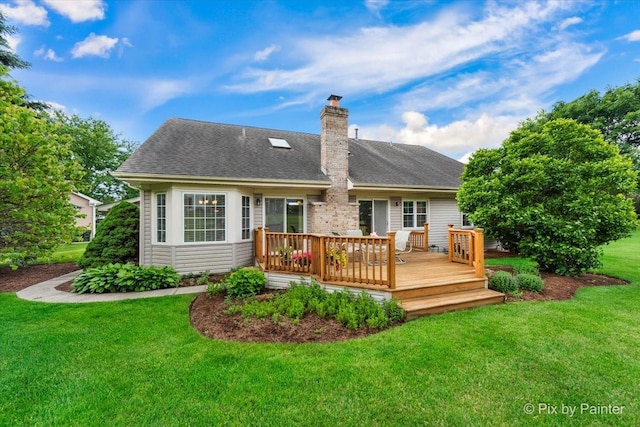 6 Ennis Ct, Cary, IL 60013 - rear view of house featuring a yard, a chimney, a deck, and a shingled roof