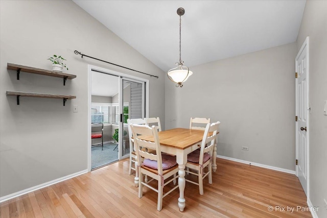 6 Ennis Ct, Cary, IL 60013 - dining space featuring vaulted ceiling and light wood-type flooring