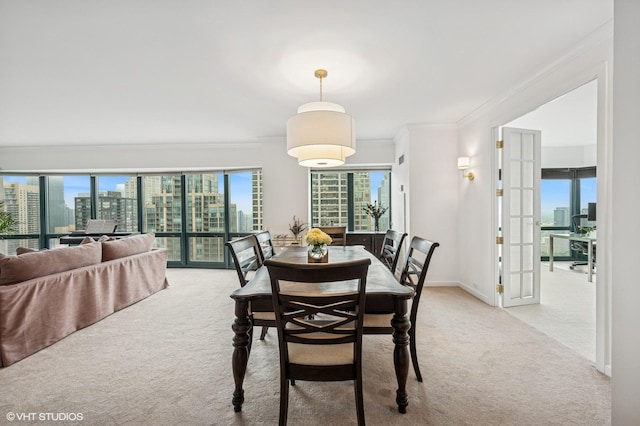 100 E Huron St Unit 3501, Chicago, IL 60611 - dining space featuring a view of skyline, carpet, and ornamental molding