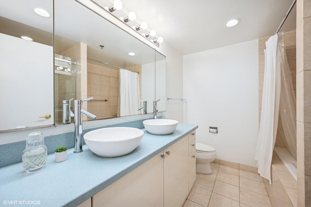 100 E Huron St Unit 3501, Chicago, IL 60611 - full bath featuring tiled shower, double vanity, tile patterned flooring, and recessed lighting