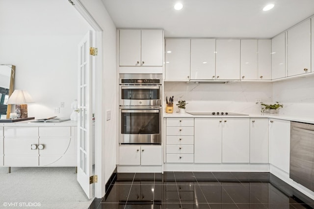 100 E Huron St Unit 3501, Chicago, IL 60611 - kitchen with appliances with stainless steel finishes, white cabinetry, light countertops, recessed lighting, and granite floors