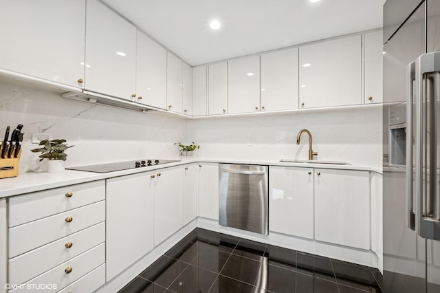 100 E Huron St Unit 3501, Chicago, IL 60611 - kitchen with stainless steel dishwasher, black electric cooktop, refrigerator with ice dispenser, white cabinetry, and recessed lighting