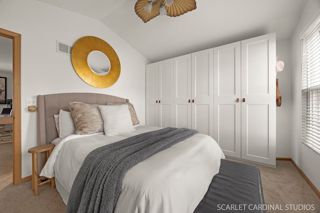 802 Symphony Dr, Aurora, IL 60504 - bedroom featuring vaulted ceiling and light carpet