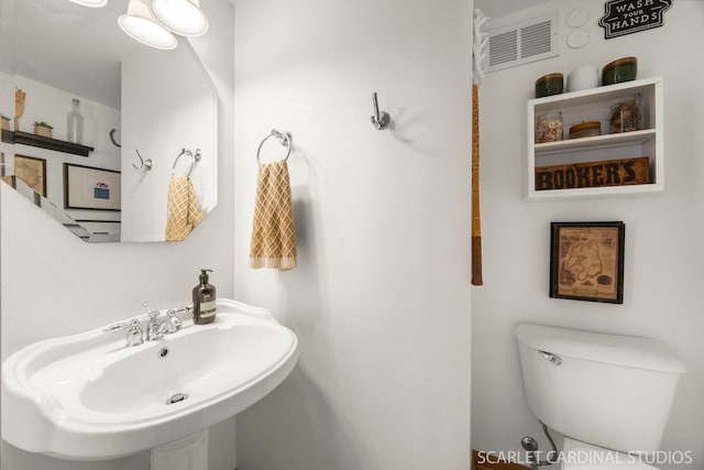 802 Symphony Dr, Aurora, IL 60504 - bathroom with a sink and toilet