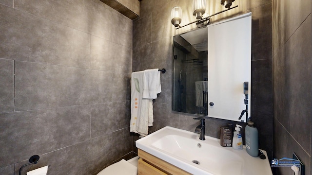 910 N Lake Shore Dr Unit 2317, Chicago, IL 60611 - half bathroom with vanity and tile walls