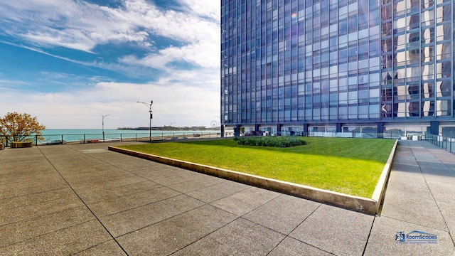 910 N Lake Shore Dr Unit 2317, Chicago, IL 60611 - surrounding community with a water view and a lawn