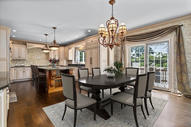 1325 Westley Ln, West Dundee, IL 60118 - dining area with a chandelier, healthy amount of natural light, ornamental molding, dark wood-style floors, and recessed lighting