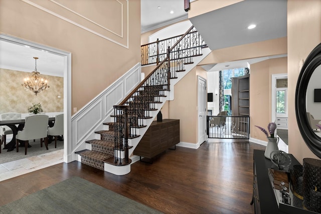 1325 Westley Ln, West Dundee, IL 60118 - foyer entrance with a chandelier, wood finished floors, stairway, recessed lighting, and crown molding