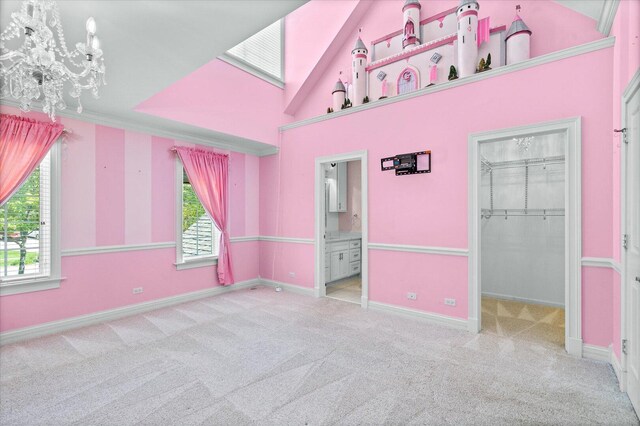 1325 Westley Ln, West Dundee, IL 60118 - unfurnished bedroom with carpet flooring, multiple windows, a spacious closet, and a chandelier