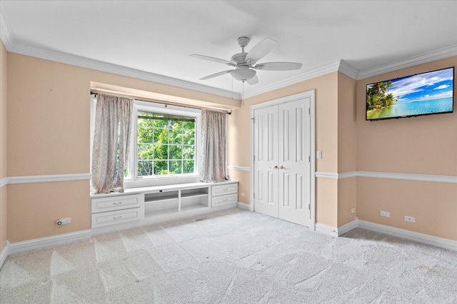 1325 Westley Ln, West Dundee, IL 60118 - unfurnished bedroom with ornamental molding, carpet, a closet, and ceiling fan