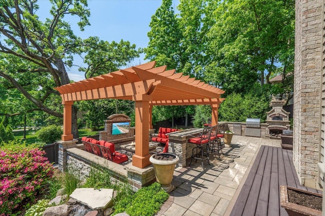 1325 Westley Ln, West Dundee, IL 60118 - view of patio with exterior kitchen, a pergola, and an outdoor living space with a fireplace