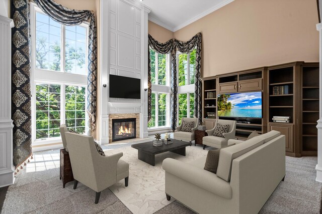 1325 Westley Ln, West Dundee, IL 60118 - living room with light colored carpet, a glass covered fireplace, healthy amount of natural light, crown molding, and a high ceiling
