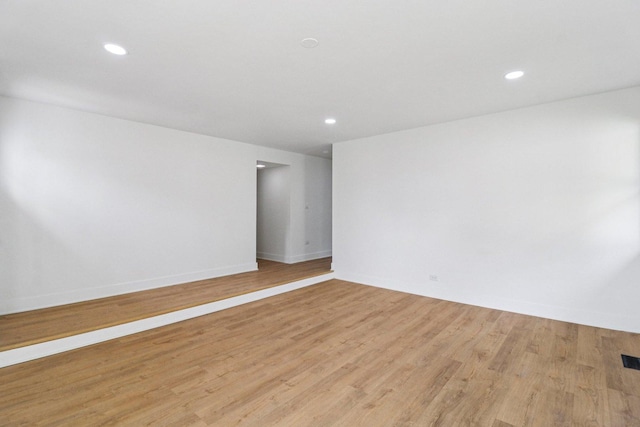 5216 Arlington Cir, Hanover Park, IL 60133 - unfurnished room featuring recessed lighting and light wood-style flooring