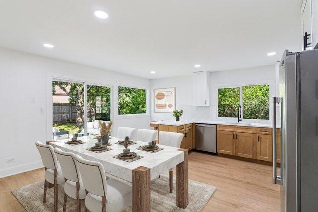 5216 Arlington Cir, Hanover Park, IL 60133 - dining room featuring light wood-style flooring and recessed lighting