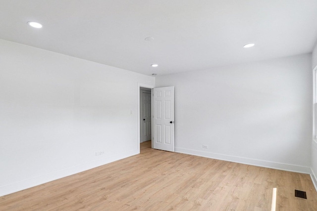 5216 Arlington Cir, Hanover Park, IL 60133 - unfurnished room featuring light wood-style floors and recessed lighting