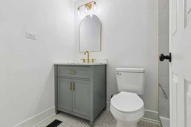 5216 Arlington Cir, Hanover Park, IL 60133 - bathroom with baseboards and vanity