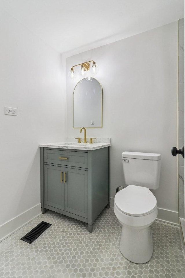 5216 Arlington Cir, Hanover Park, IL 60133 - bathroom featuring vanity and toilet