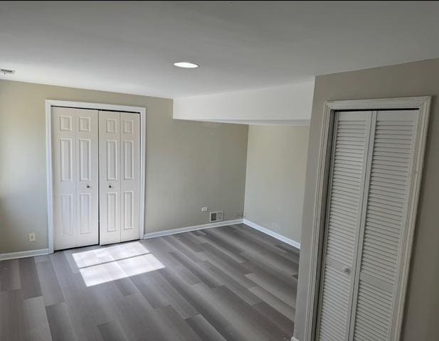 1214 Vista Dr, Gurnee, IL 60031 - unfurnished bedroom with wood finished floors and baseboards