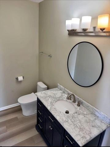 1214 Vista Dr, Gurnee, IL 60031 - bathroom with vanity and wood finished floors