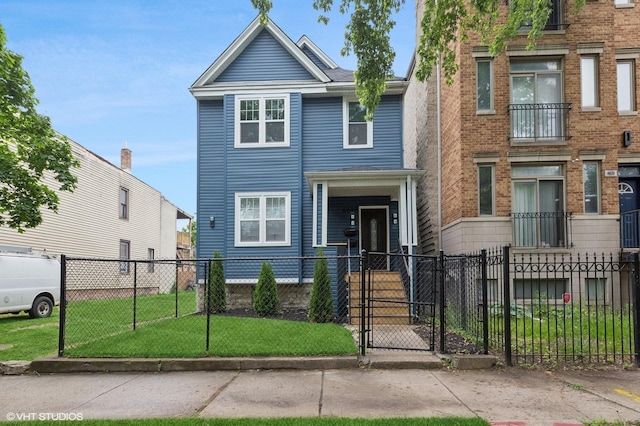 6630 S Drexel Ave, Chicago, IL 60637 - view of front of home featuring a fenced front yard and a gate